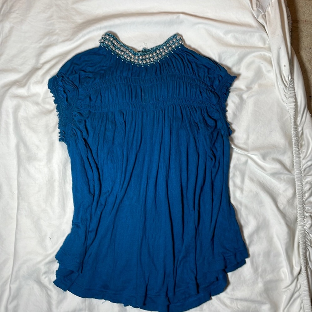 Deep Aegean Sea blue free people top w/pearl neckline. Light, airy and swingy.